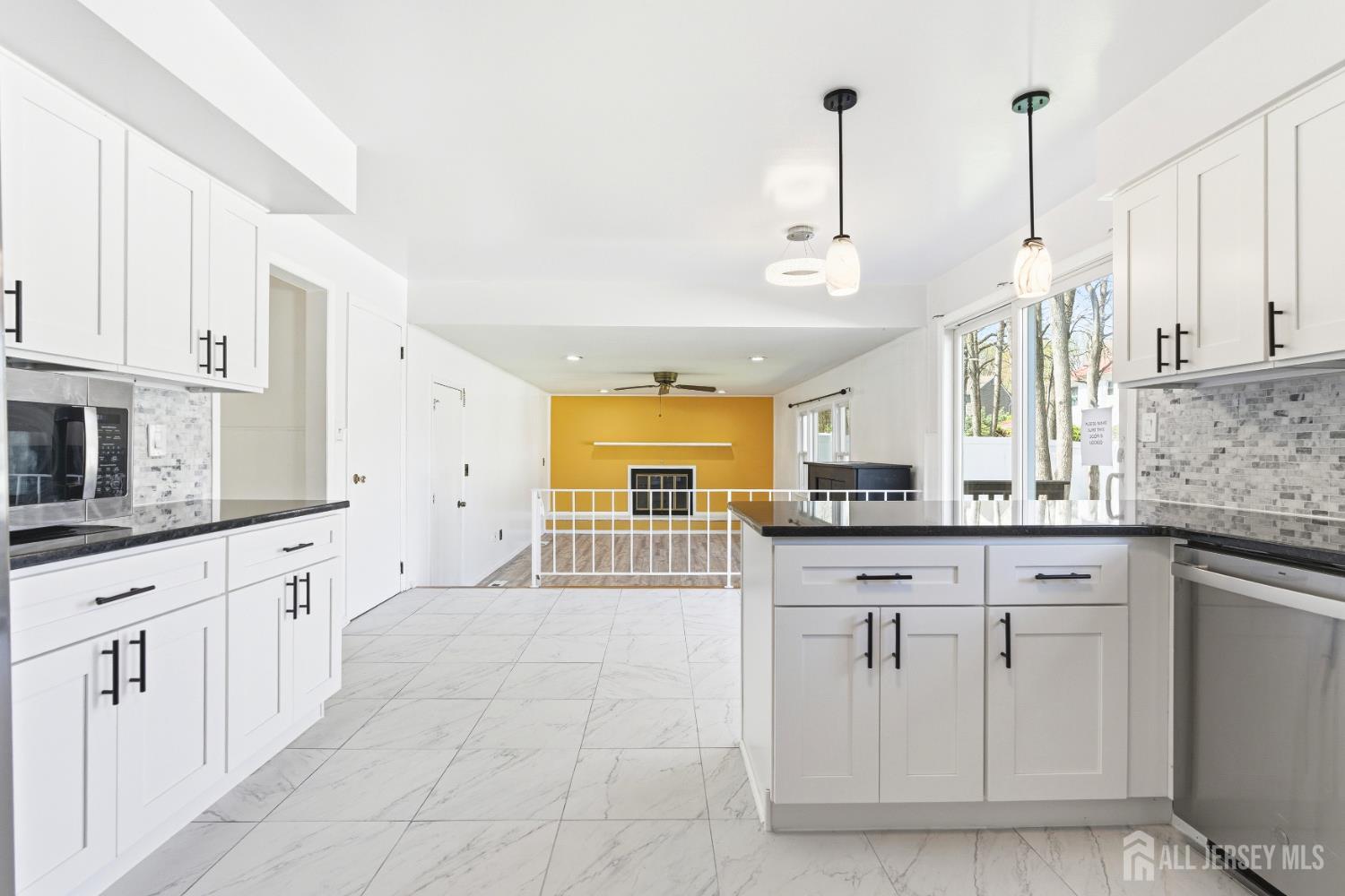 7 Oberlin Court Edison, NJ 08820 - Photo 14 of 45 a large kitchen with cabinets