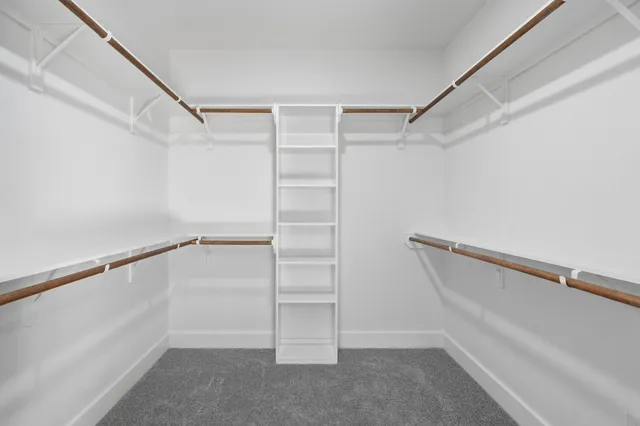 a view of an empty walk in closet