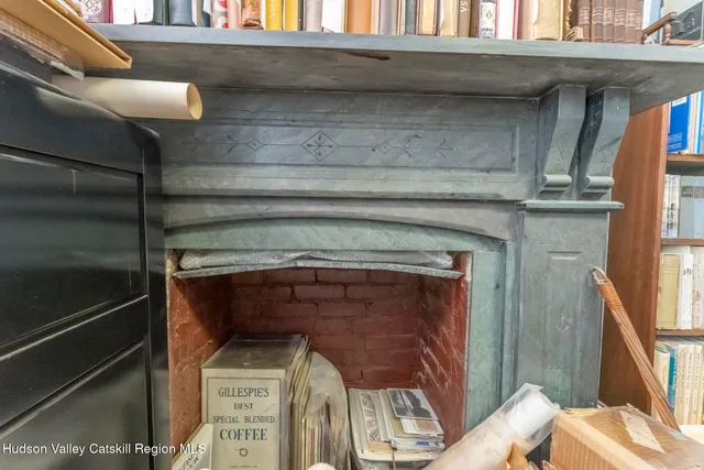 a view of a hallway with entryway door