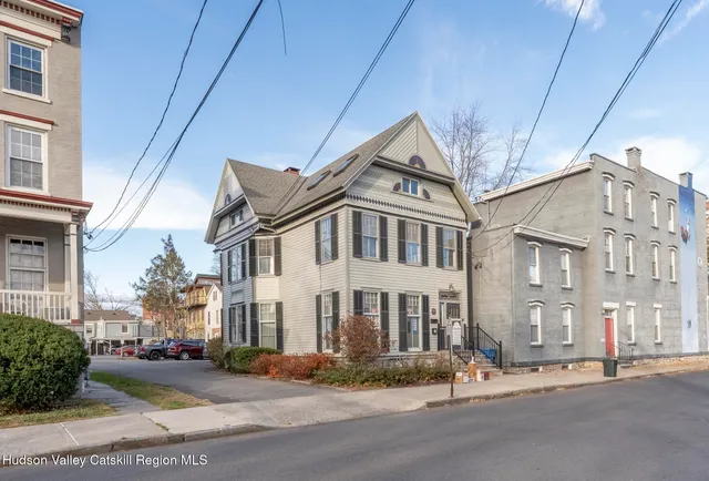 a view of a building with a street