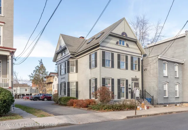a front view of a building with street view
