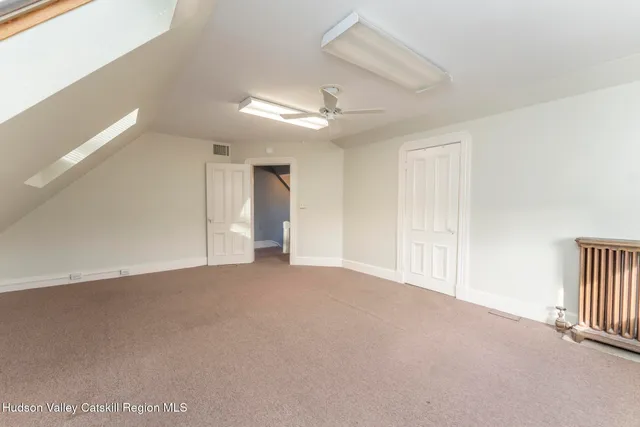 a view of a street in front of a building