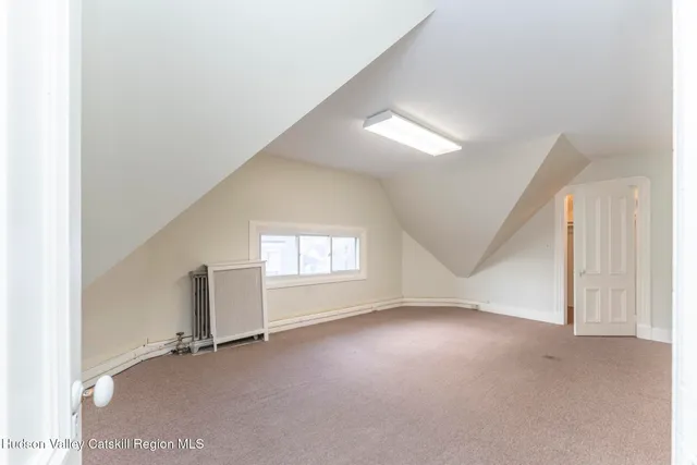 a view of a street with cars