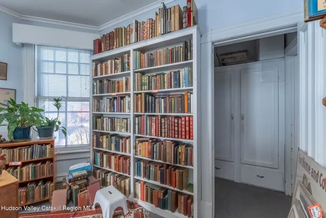 a view of a workspace with furniture and toys