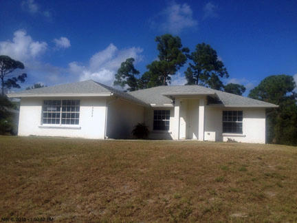 7302 Hibiscus Road Fort Pierce, FL 34951 - Photo 3 of 11 exteriorfront
