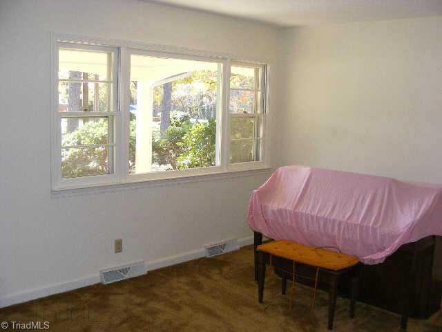 3301 Oak Ridge Road Summerfield, NC 27358 - Photo 7 of 8 Other. Freshly painted living room.