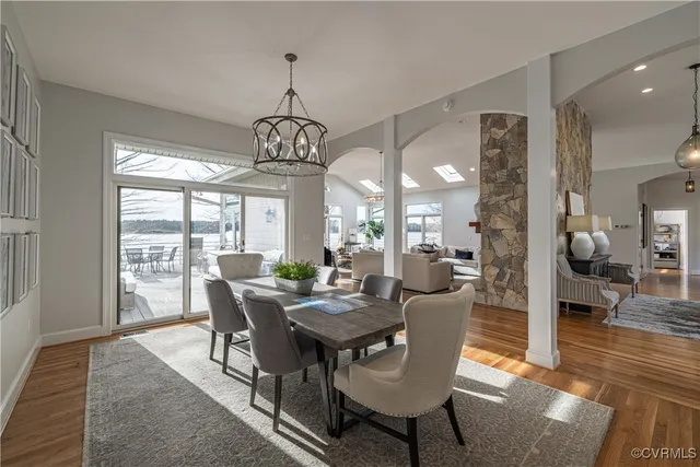 a kitchen with a stove a refrigerator and a sink