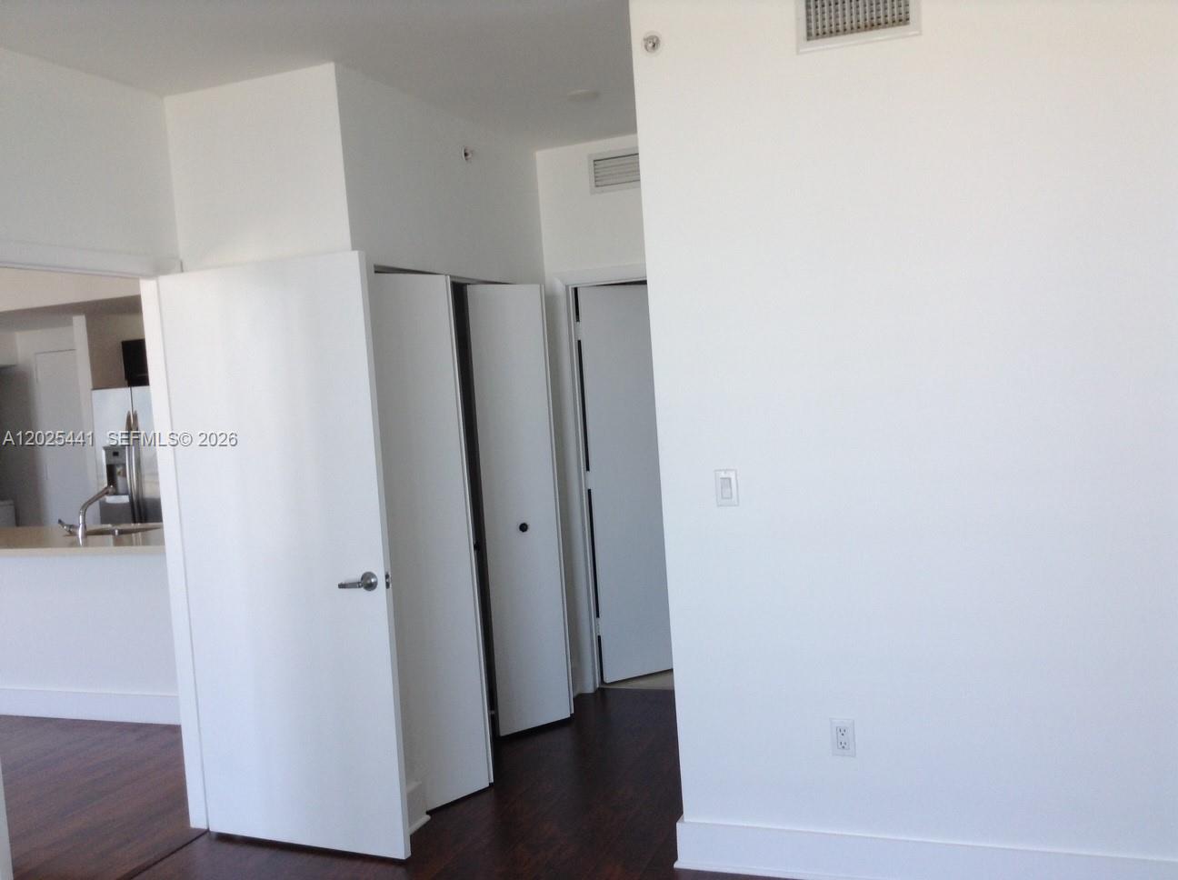 90 Southwest 3rd Street, Unit 3708 Miami, FL 33130 - Photo 11 of 13 a view of a hallway with wooden floor