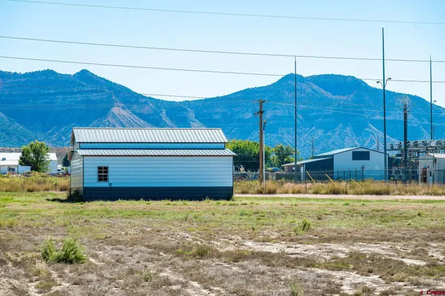 a house view with a backyard space