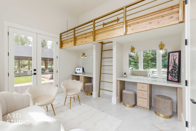 1188 South Old Trappers Loop Road Huntsville, UT 84317 - Photo 32 of 92 Interior space with a wood-finish loft featuring a gold-toned railing and ladder, dual vanity stations with integrated mirrors and wall sconces, and white tile flooring
