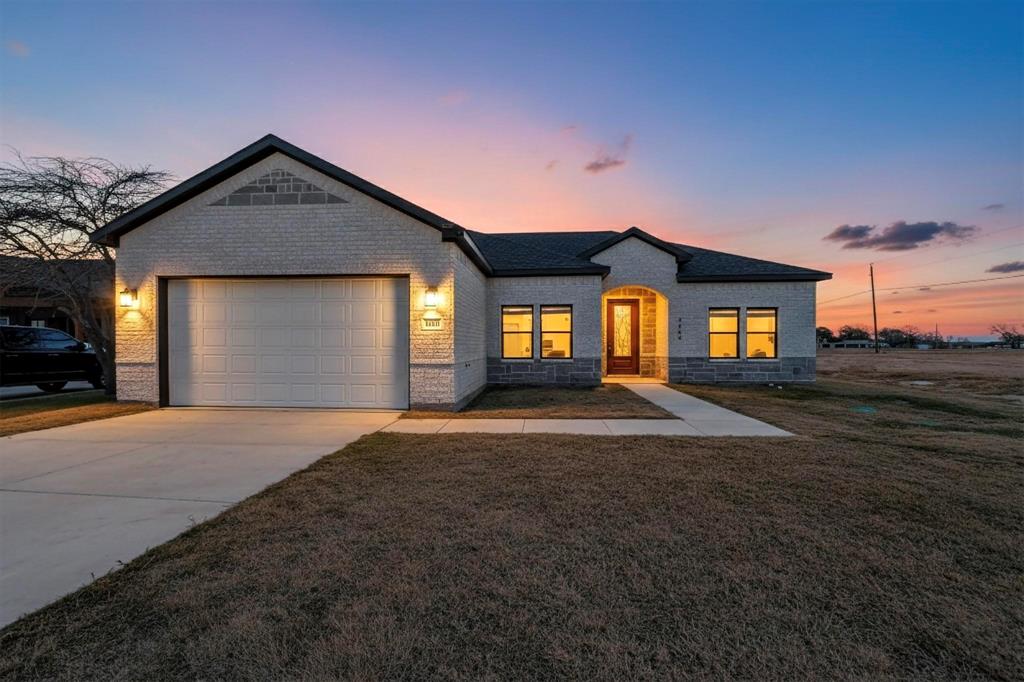 4464 Key Ranch Road Trinidad, TX 75163 - Photo 1 of 40 View of front of property with concrete driveway, a garage, a front lawn, and brick siding