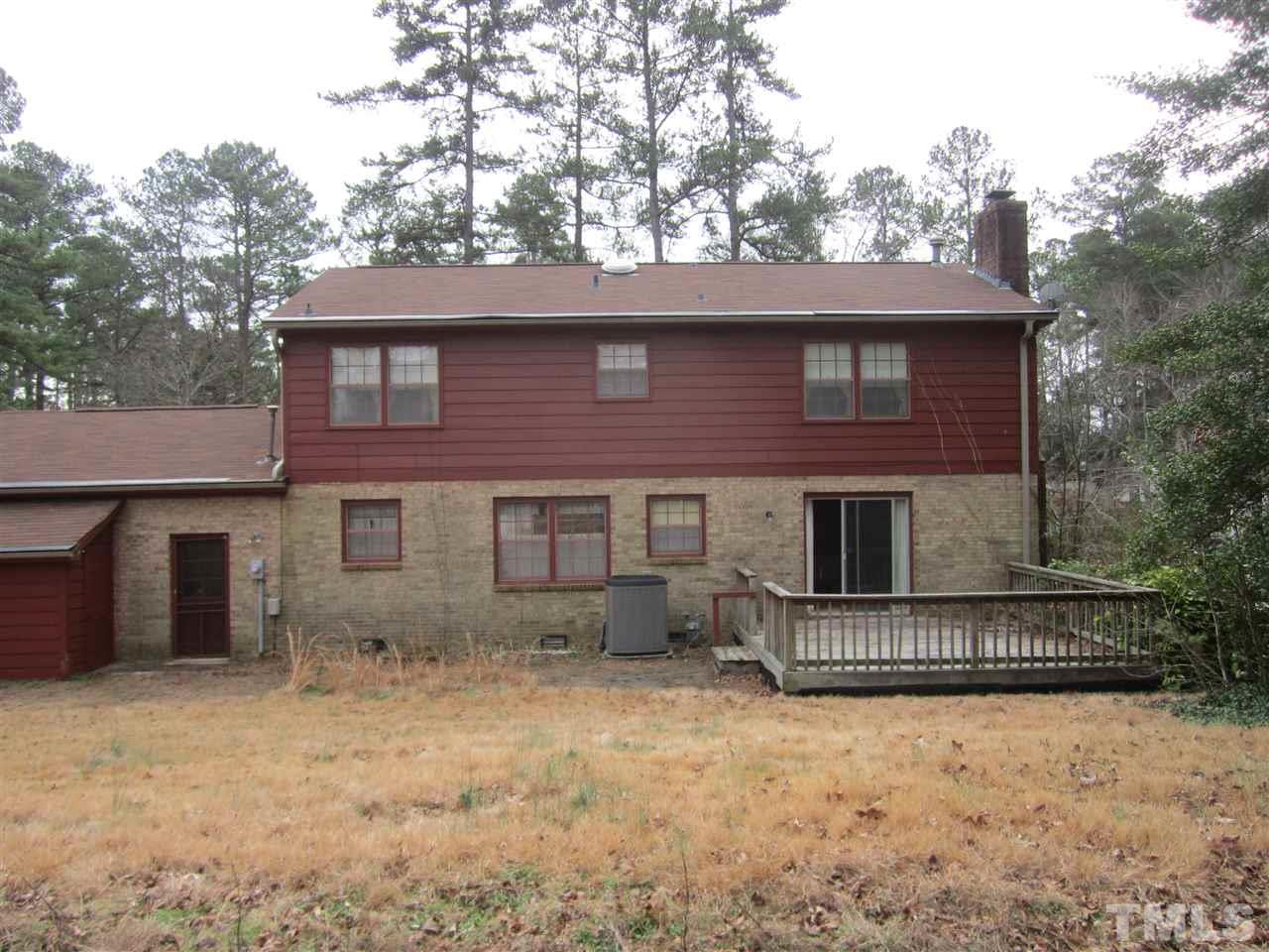 1401 Falls Church Road Raleigh, NC 27609 - Photo 2 of 11 front view of a house with a yard