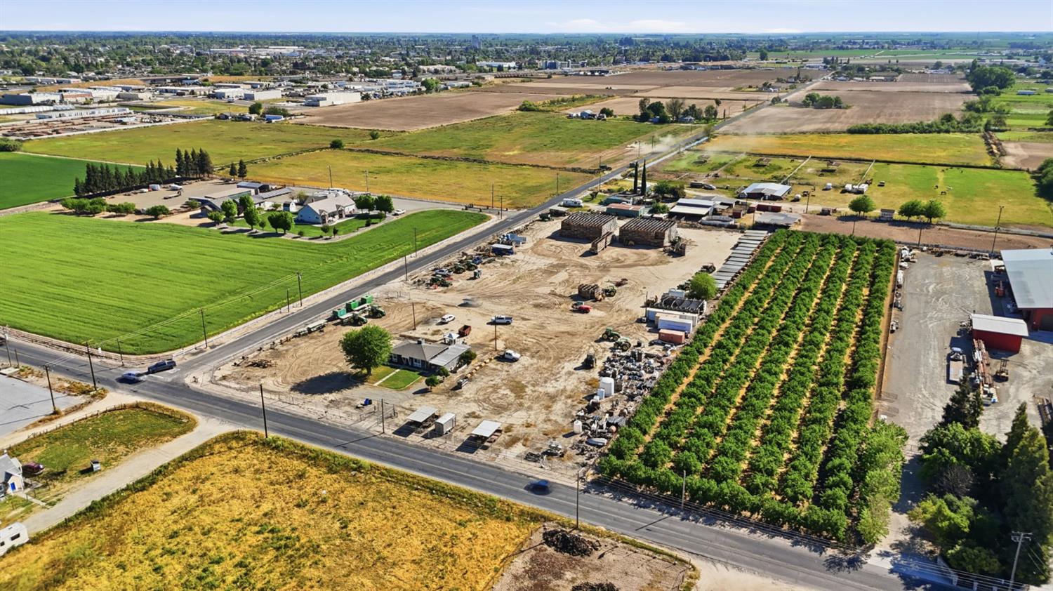 2406 South Walnut Road Turlock, CA 95380 - Photo 40 of 42 an aerial view of a residential building with an ocean view
