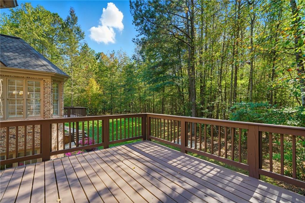 107 Smith Forest Lane Alpharetta, GA 30004 - Photo 26 of 29 a view of balcony with wooden floor and fence