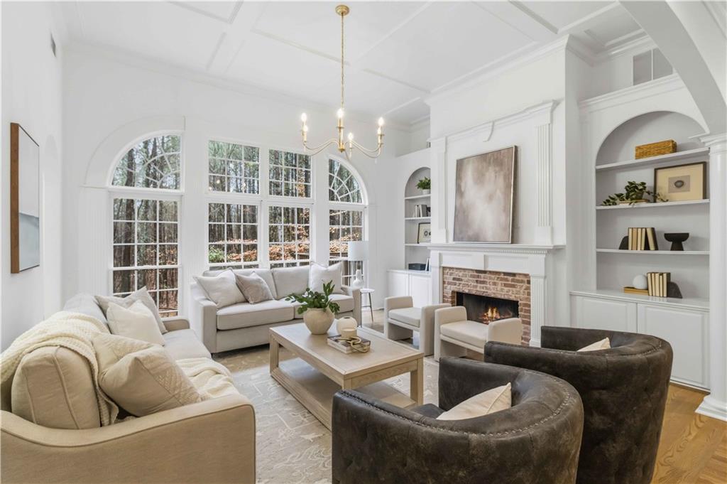 107 Smith Forest Lane Alpharetta, GA 30004 - Photo 6 of 29 a living room with furniture and a fireplace