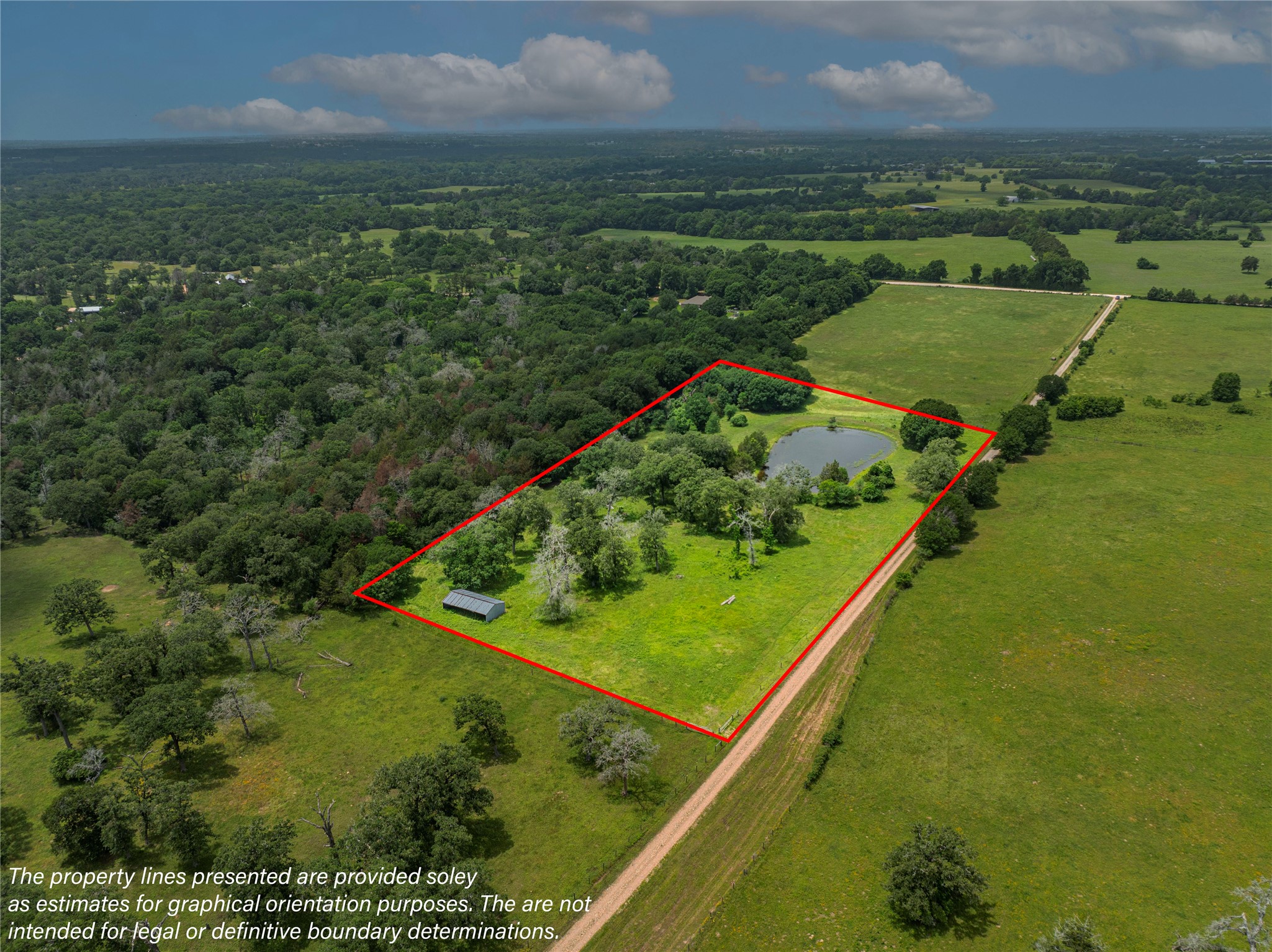 Lot 2 Mill Creek Ranch Road Bellville, TX 77418 - Photo 11 of 11 an aerial view of river residential houses with outdoor space and swimming pool