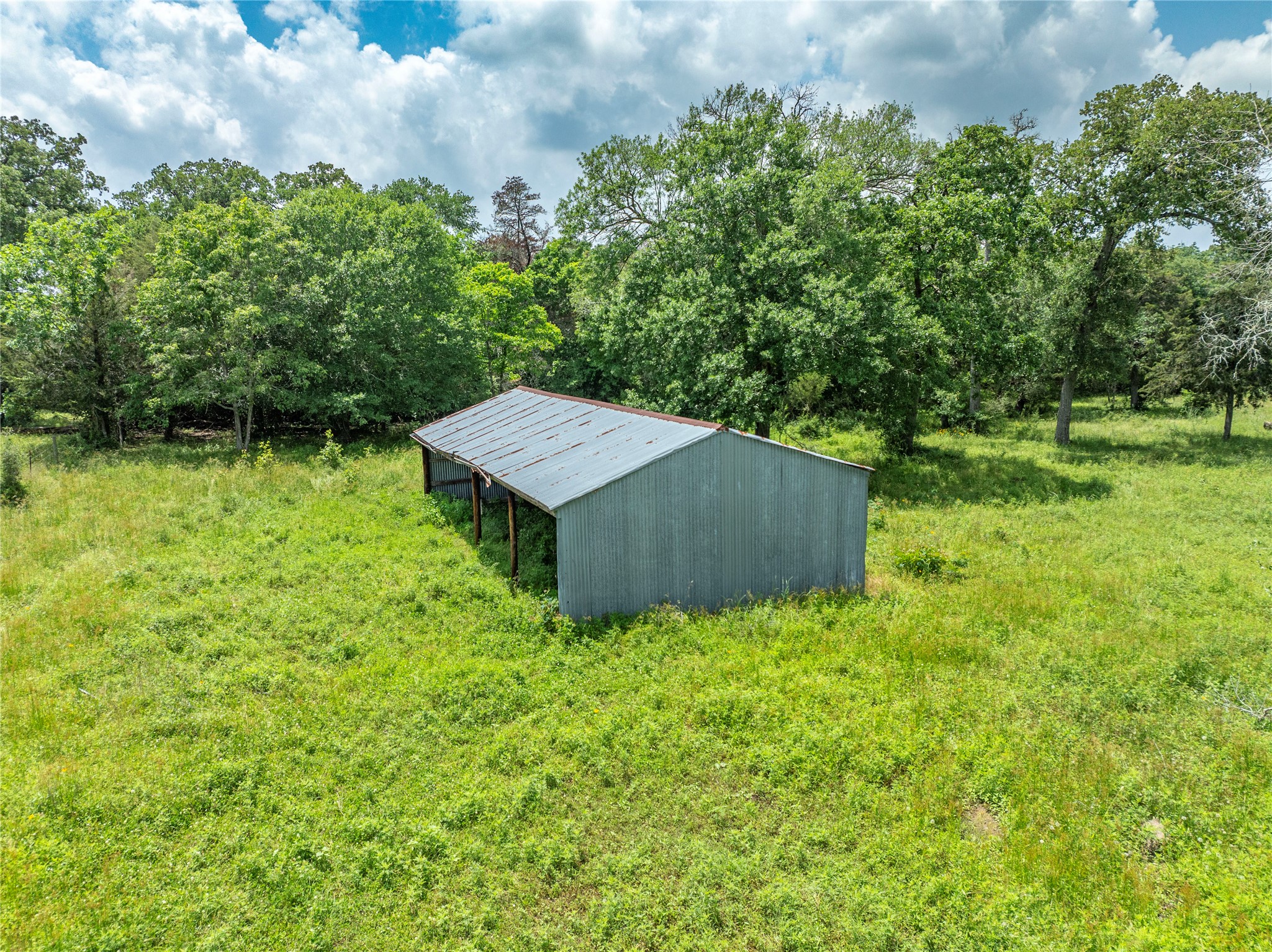 Lot 2 Mill Creek Ranch Road Bellville, TX 77418 - Photo 2 of 11 a backyard of a house with lots of green space