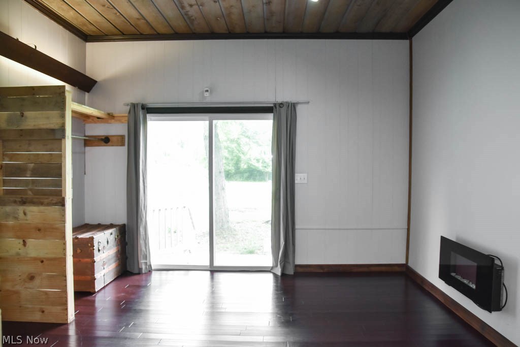 3703 Johnson Road Norton, OH 44203 - Photo 11 of 24 A sliding barn door leads from the great room to this family room with nearly 10-foot ceilings and a sliding door to the backyard. It could also be used as a master bedroom!