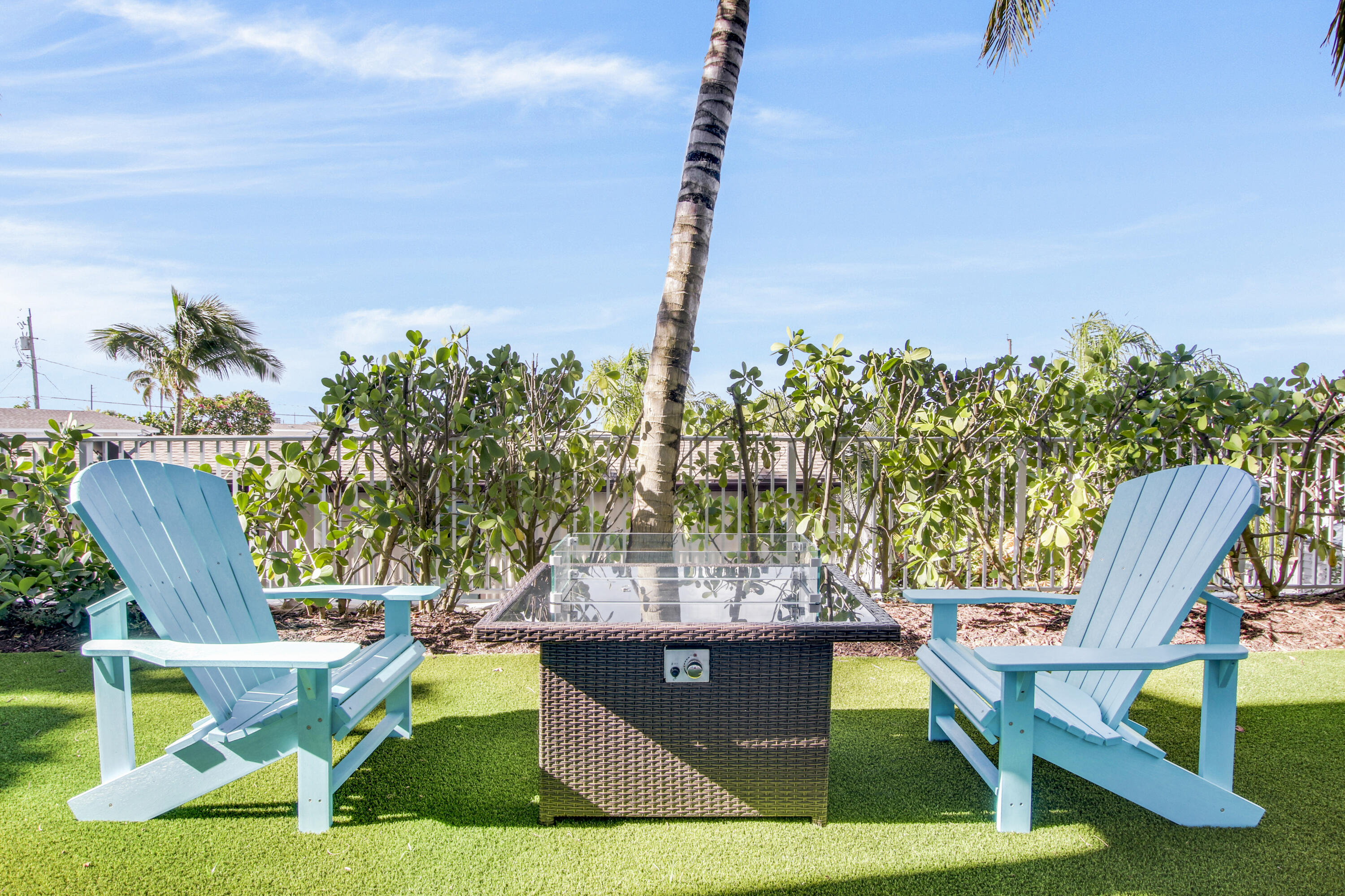 132 Ocean Breeze Drive Juno Beach, FL 33408 - Photo 19 of 33 a view of a chairs and table in the patio