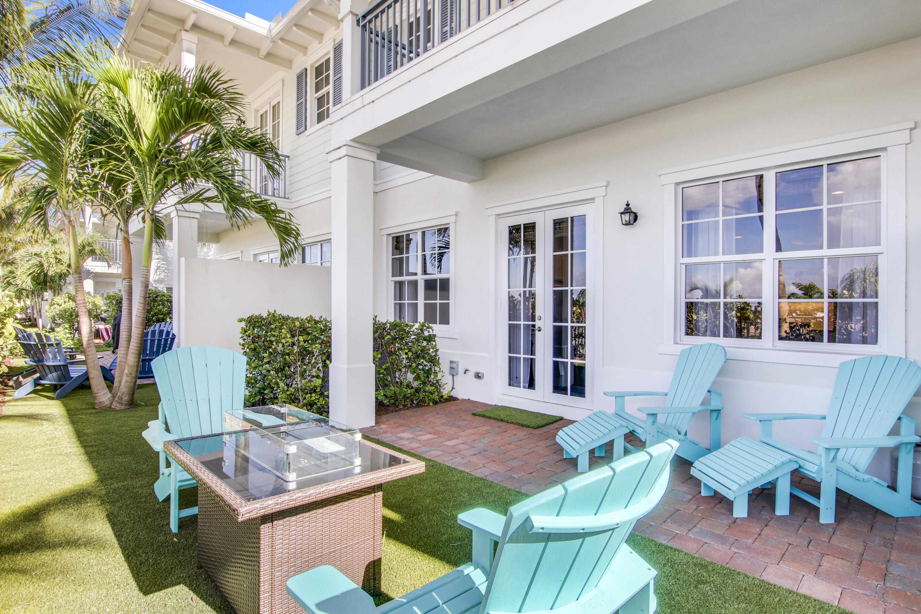 132 Ocean Breeze Drive Juno Beach, FL 33408 - Photo 20 of 33 a view of an house with backyard and sitting area