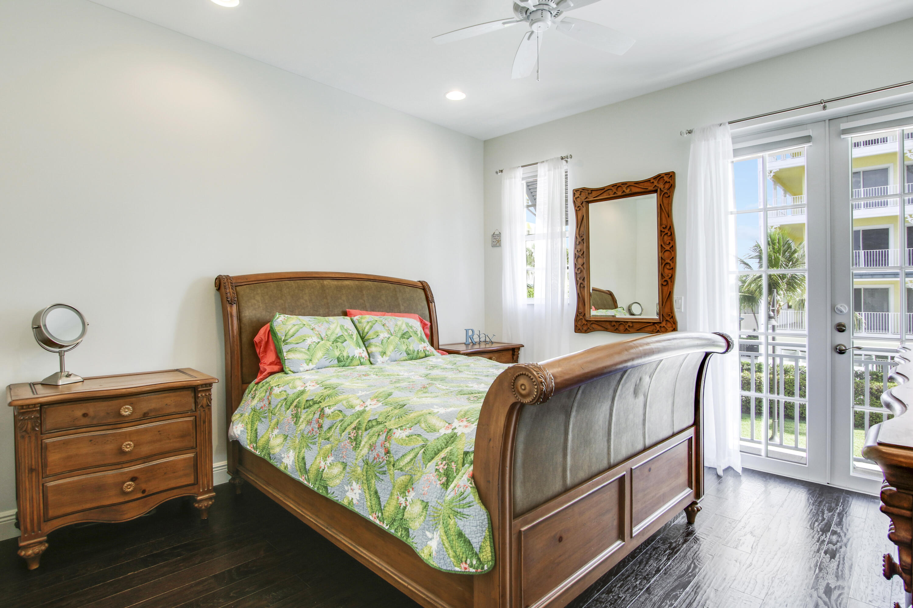 132 Ocean Breeze Drive Juno Beach, FL 33408 - Photo 27 of 33 a bedroom with a bed and a window