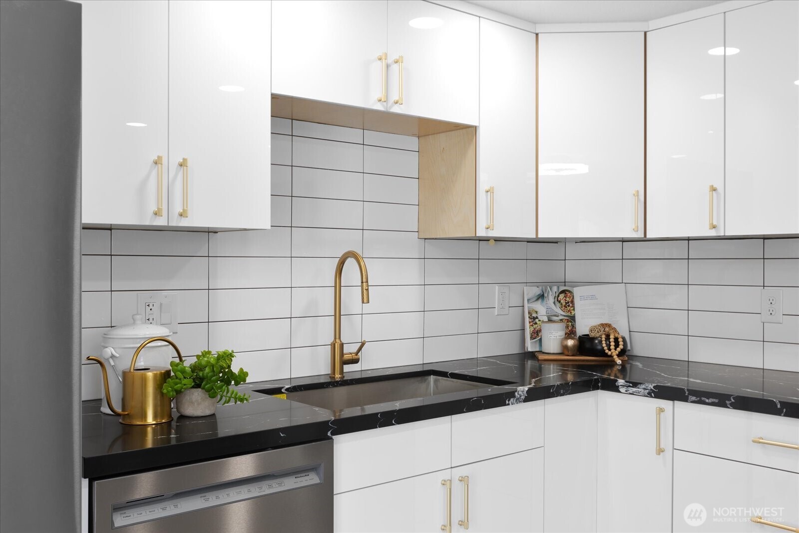 701 Pecks Drive Everett, WA 98203 - Photo 16 of 36 a kitchen with a sink and cabinets