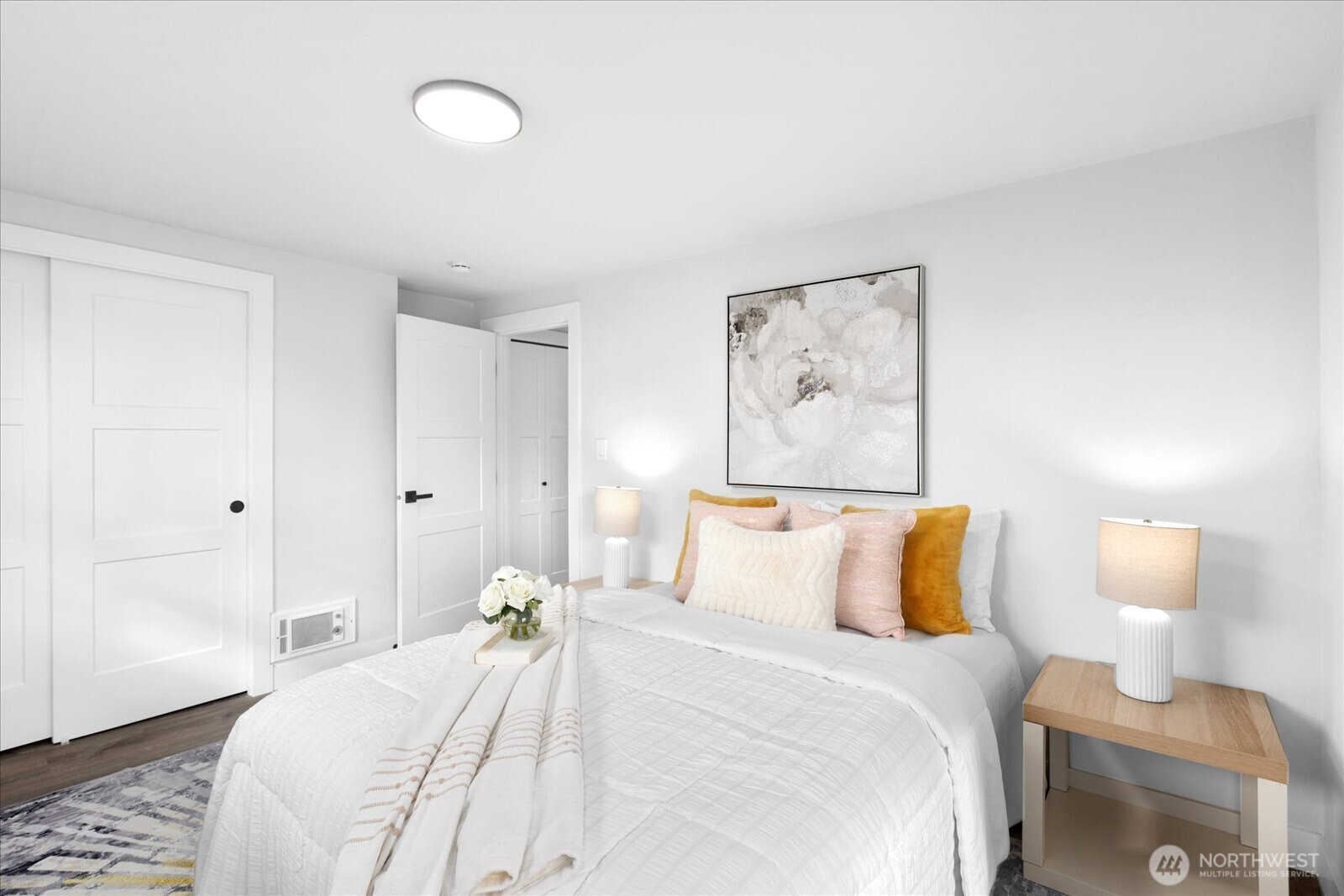 701 Pecks Drive Everett, WA 98203 - Photo 18 of 36 a bedroom with a bed and a lamp