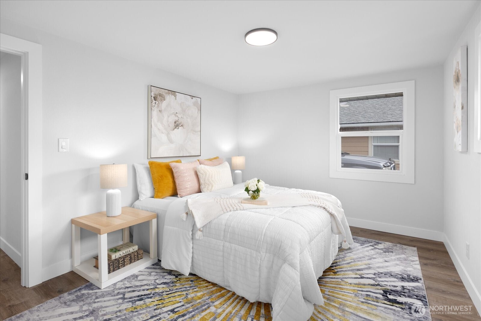 701 Pecks Drive Everett, WA 98203 - Photo 19 of 36 a bedroom with bed and window