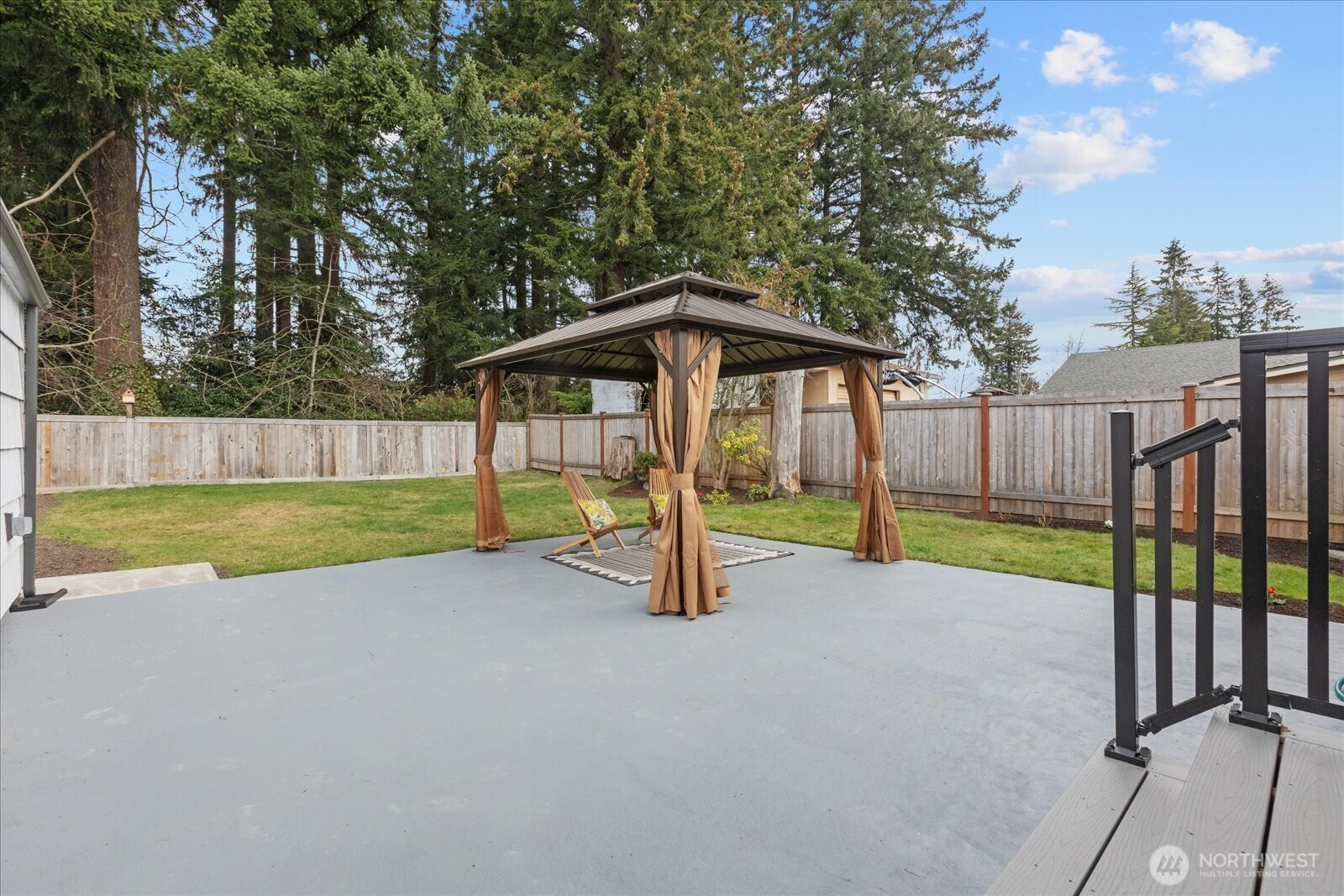 701 Pecks Drive Everett, WA 98203 - Photo 29 of 36 a view of a backyard with swimming pool