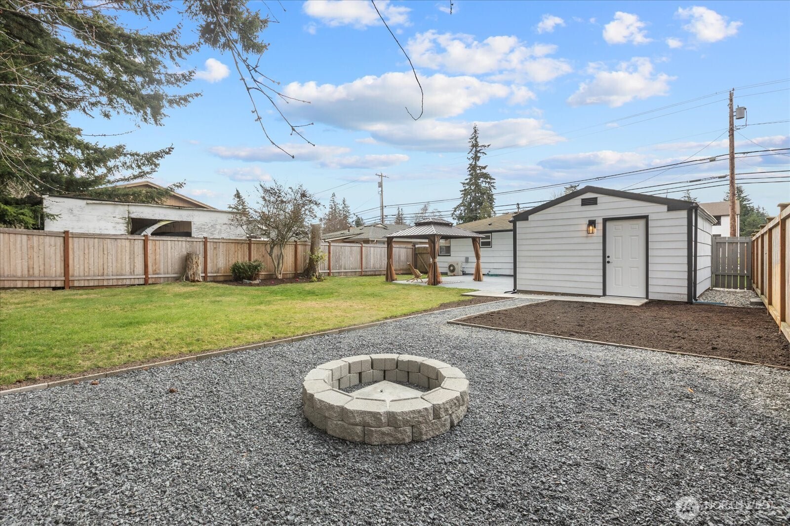 701 Pecks Drive Everett, WA 98203 - Photo 36 of 36 a view of a house with a backyard