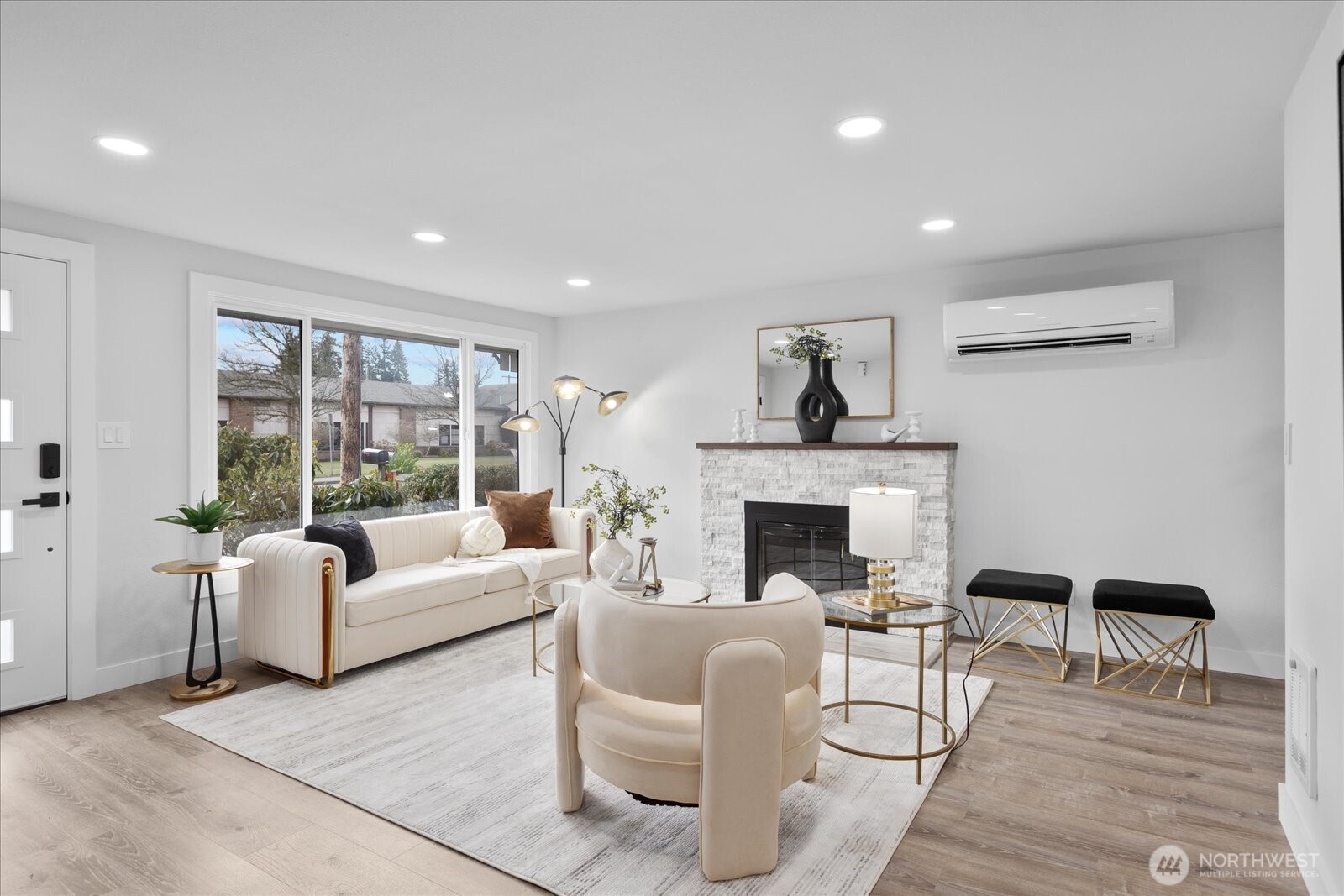 701 Pecks Drive Everett, WA 98203 - Photo 6 of 36 a living room with furniture and a fireplace