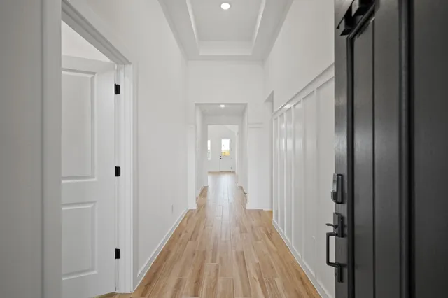 a view of a bathroom from the hallway