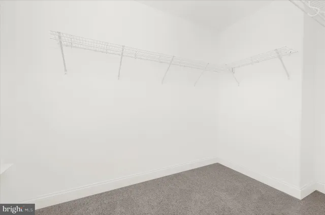 a view of a balcony with wooden floor