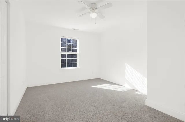 a view of swimming pool is middle in the garden