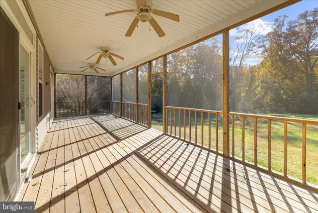 a bedroom with a bed and a flat screen television