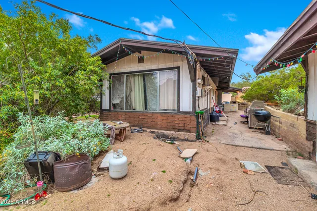 a front view of a house with patio