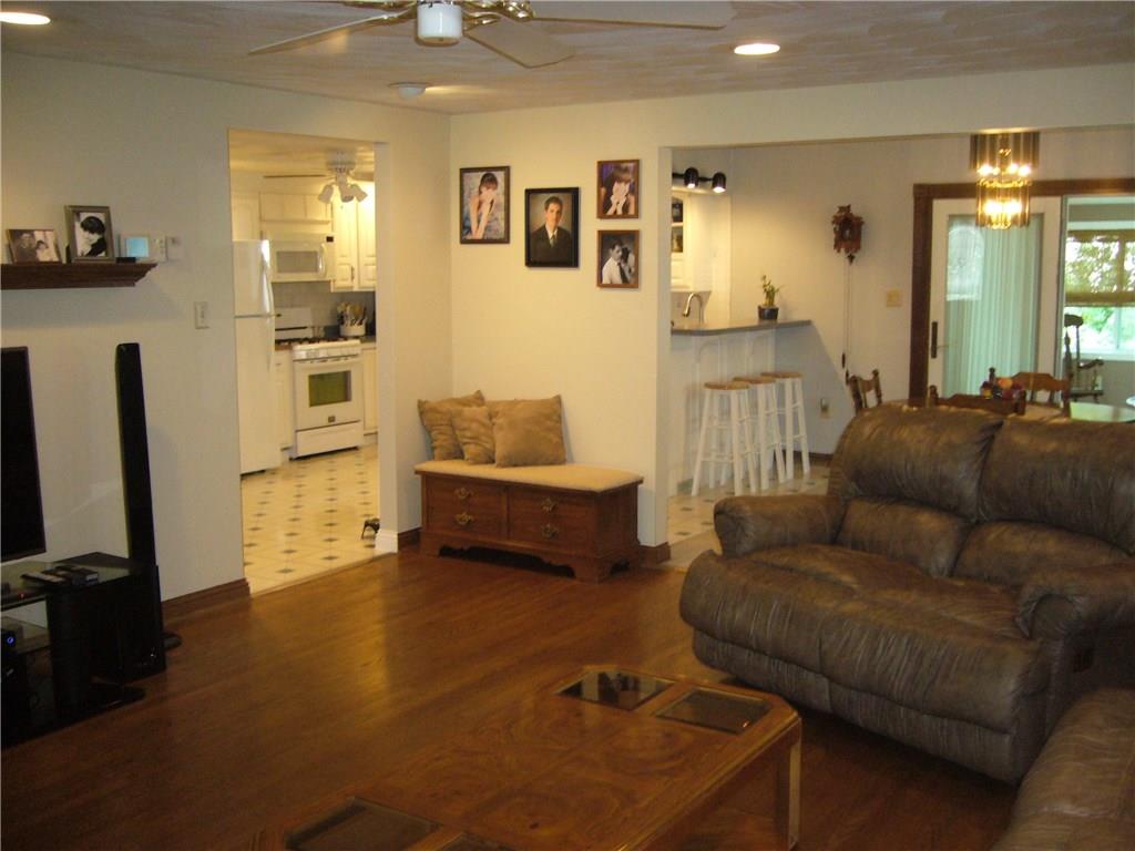 1206 Midland Beaver Road Industry, PA 15052 - Photo 2 of 19 Perfect view of the open living area! Living room, open eat-in kitchen, dining room, and four season room.