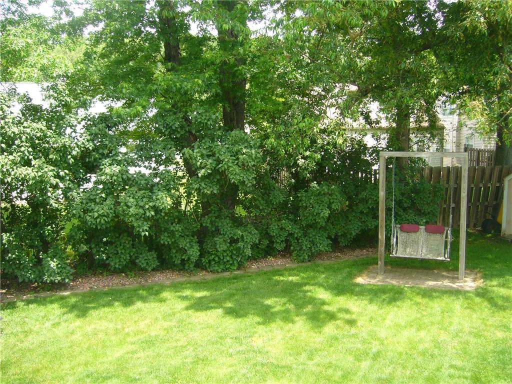 1206 Midland Beaver Road Industry, PA 15052 - Photo 15 of 19 Enjoy a little time relaxing in your park-like backyard with a swing from the Outer Banks!