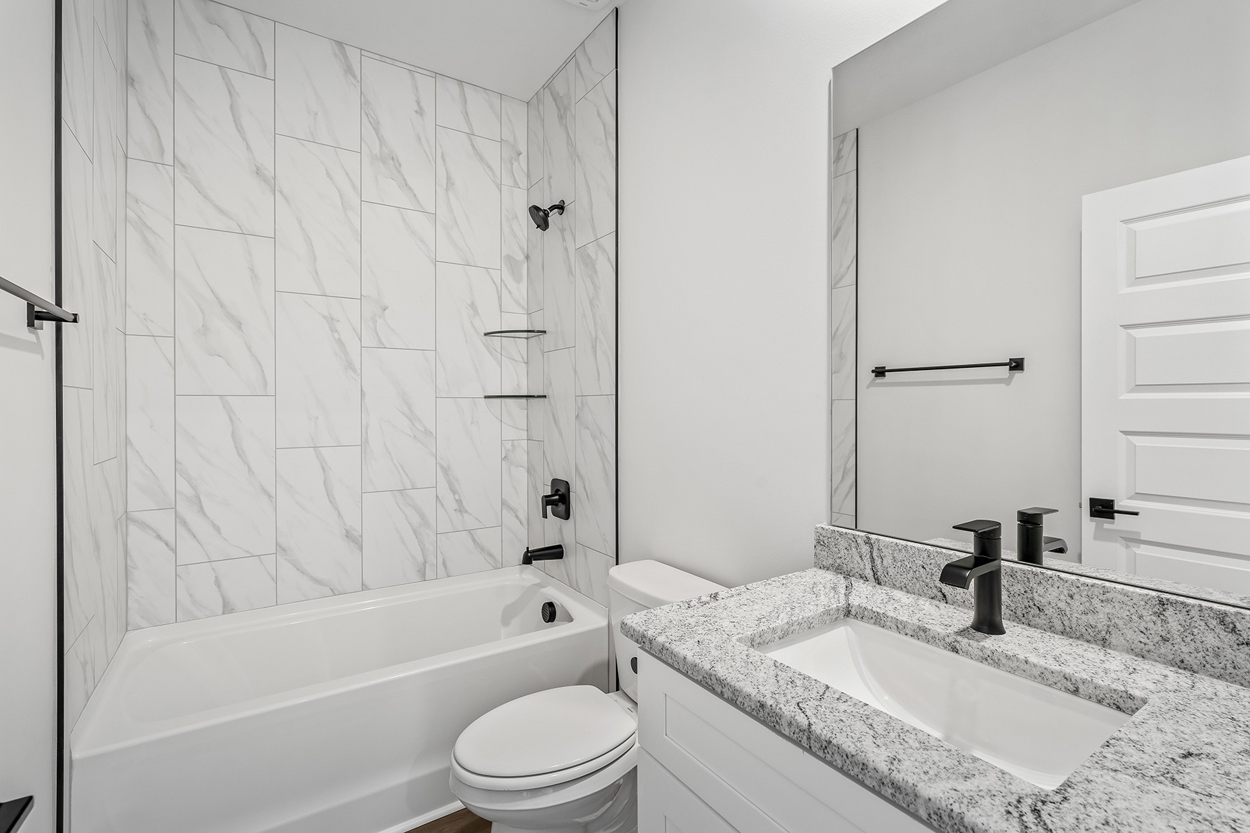 737 Brownlow Road White House, TN 37188 - Photo 16 of 16 a bathroom with a granite countertop sink toilet and shower