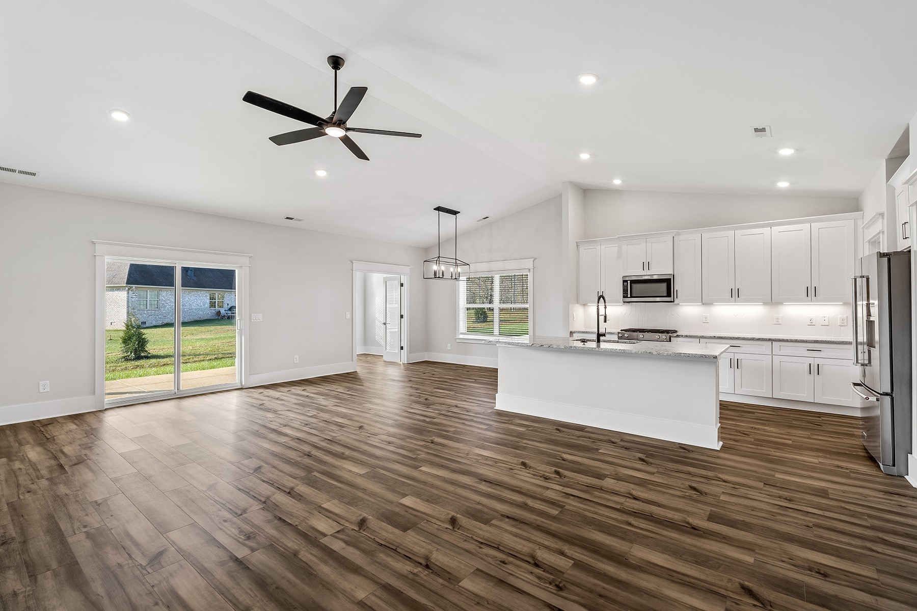 737 Brownlow Road White House, TN 37188 - Photo 3 of 16 a view of kitchen with cabinets appliances and wooden floor
