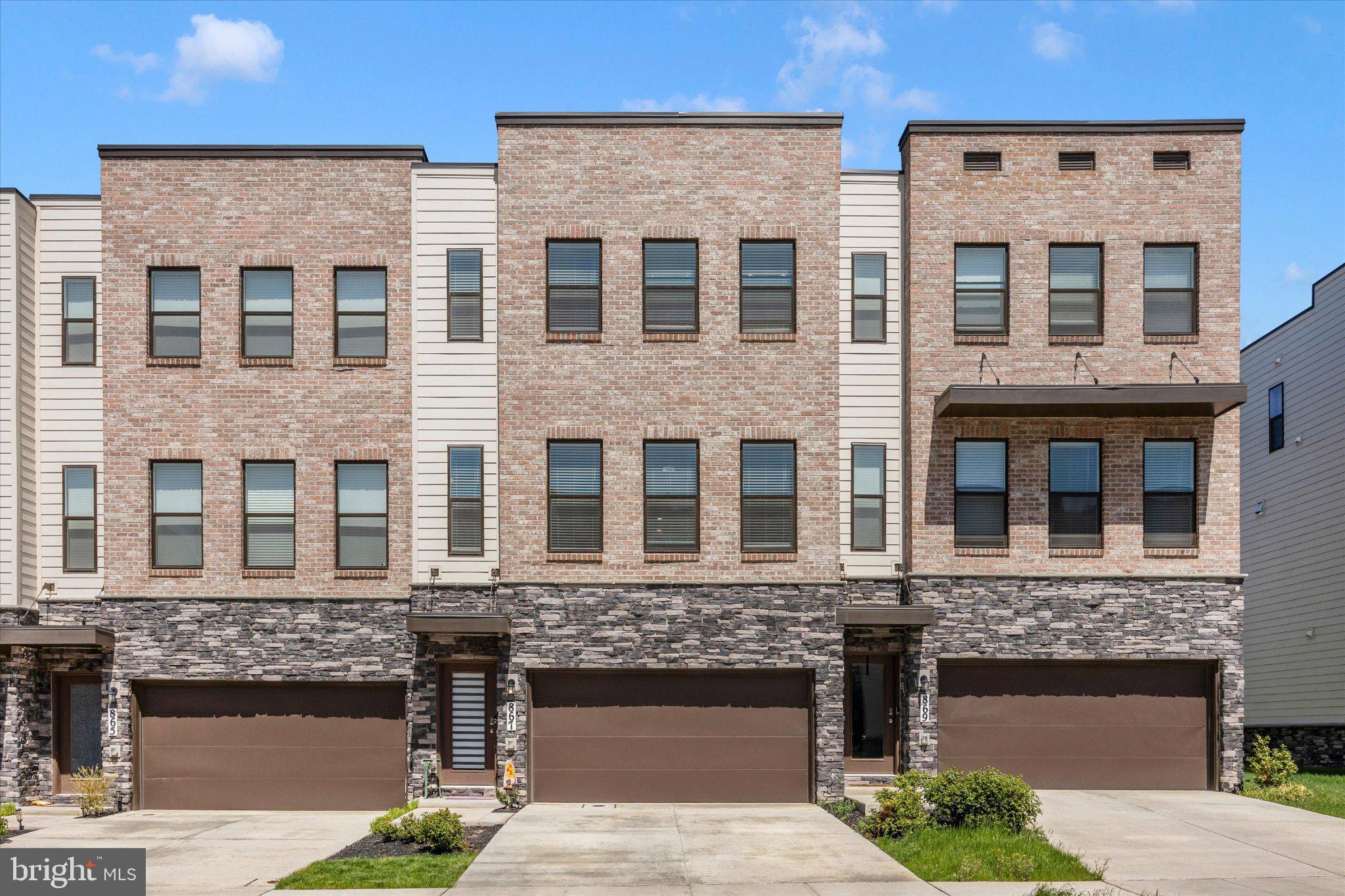 Modern townhome with stylish facade.