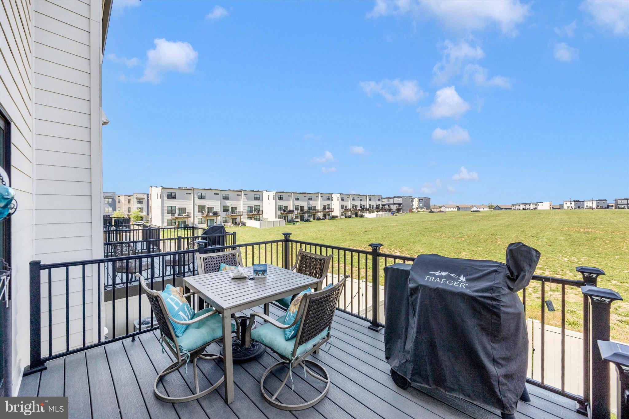867 Amity Street Frederick, MD 21701 - Photo 29 of 61 Trex deck w/ spiral staircase to large patio