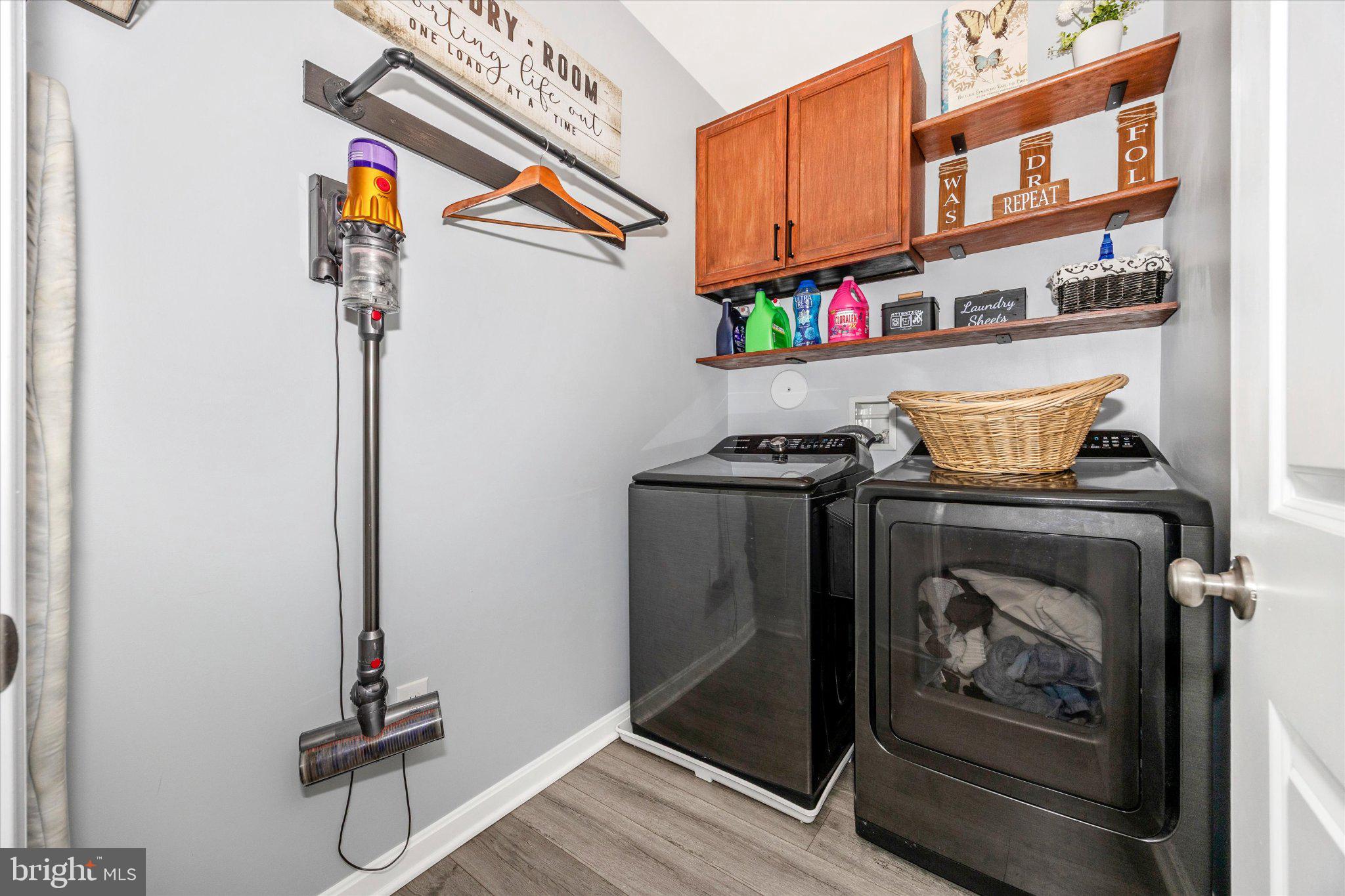 867 Amity Street Frederick, MD 21701 - Photo 46 of 61 Convenient bedroom level laundry room with LVP