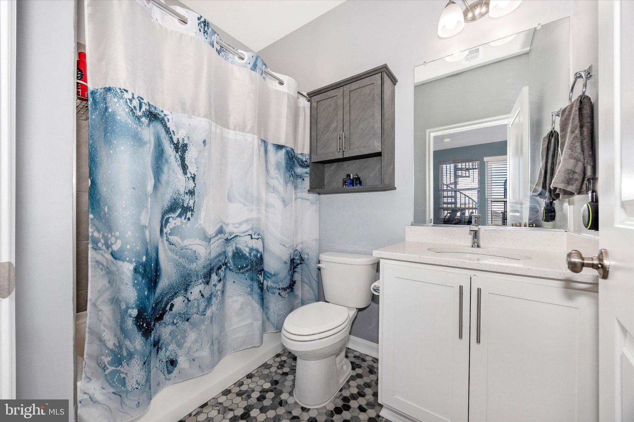 867 Amity Street Frederick, MD 21701 - Photo 51 of 61 Lower level full bath with upgraded tile floor