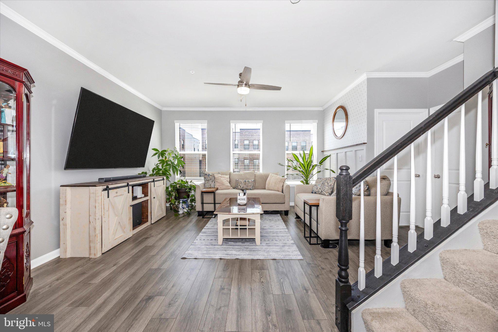 867 Amity Street Frederick, MD 21701 - Photo 6 of 61 Bright & inviting LR w/ LVP, crown molding, paint