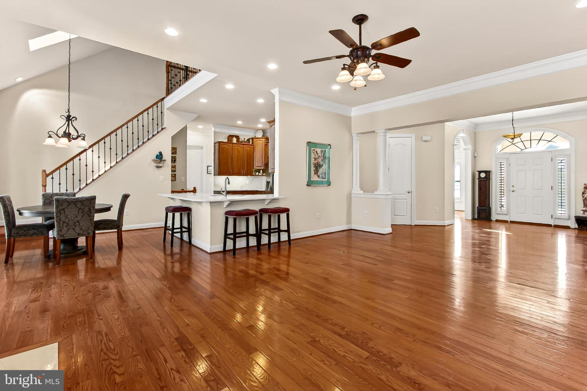 8471 Link Hills Loop Gainesville, VA 20155 - Photo 13 of 65 a view of a livingroom with furniture and a flat screen tv