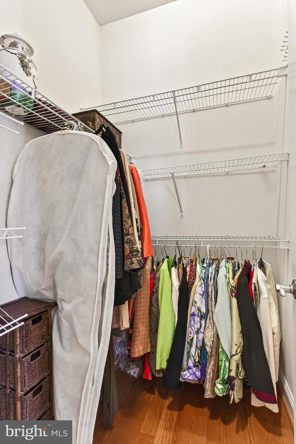 8471 Link Hills Loop Gainesville, VA 20155 - Photo 37 of 65 a view of walk in closet with clothes
