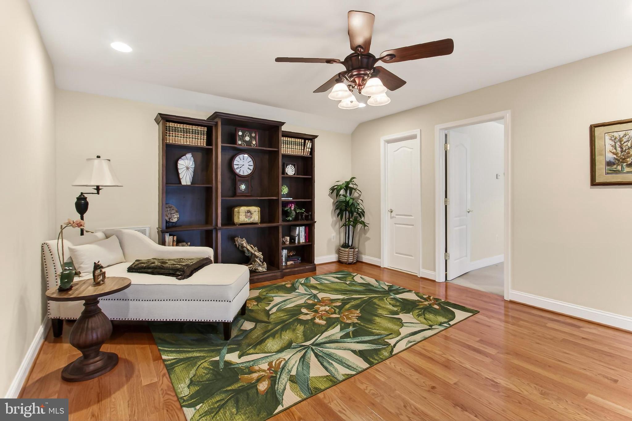 8471 Link Hills Loop Gainesville, VA 20155 - Photo 41 of 65 a living room with furniture and wooden floor