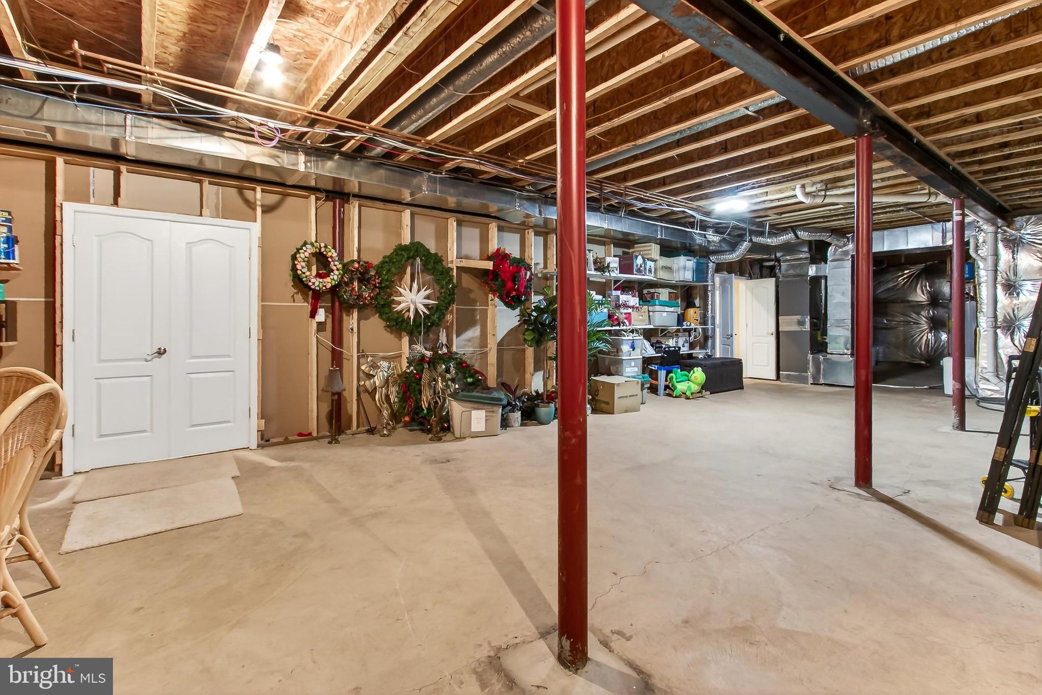 8471 Link Hills Loop Gainesville, VA 20155 - Photo 56 of 65 a view of a garage with rack and bicycle