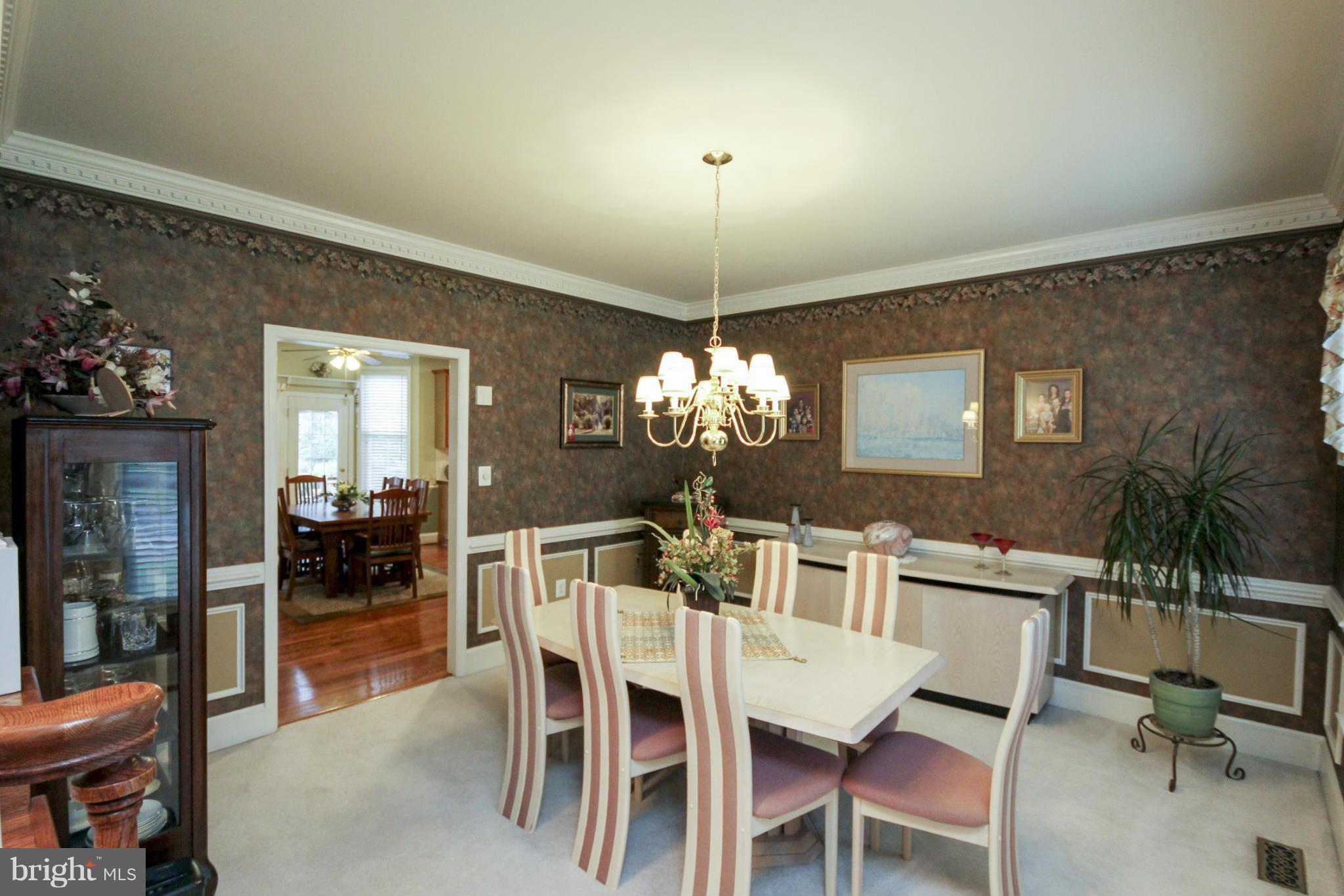 7890 Pembridge Road Manassas, VA 20112 - Photo 17 of 25 Dining Room with Detailed Molding